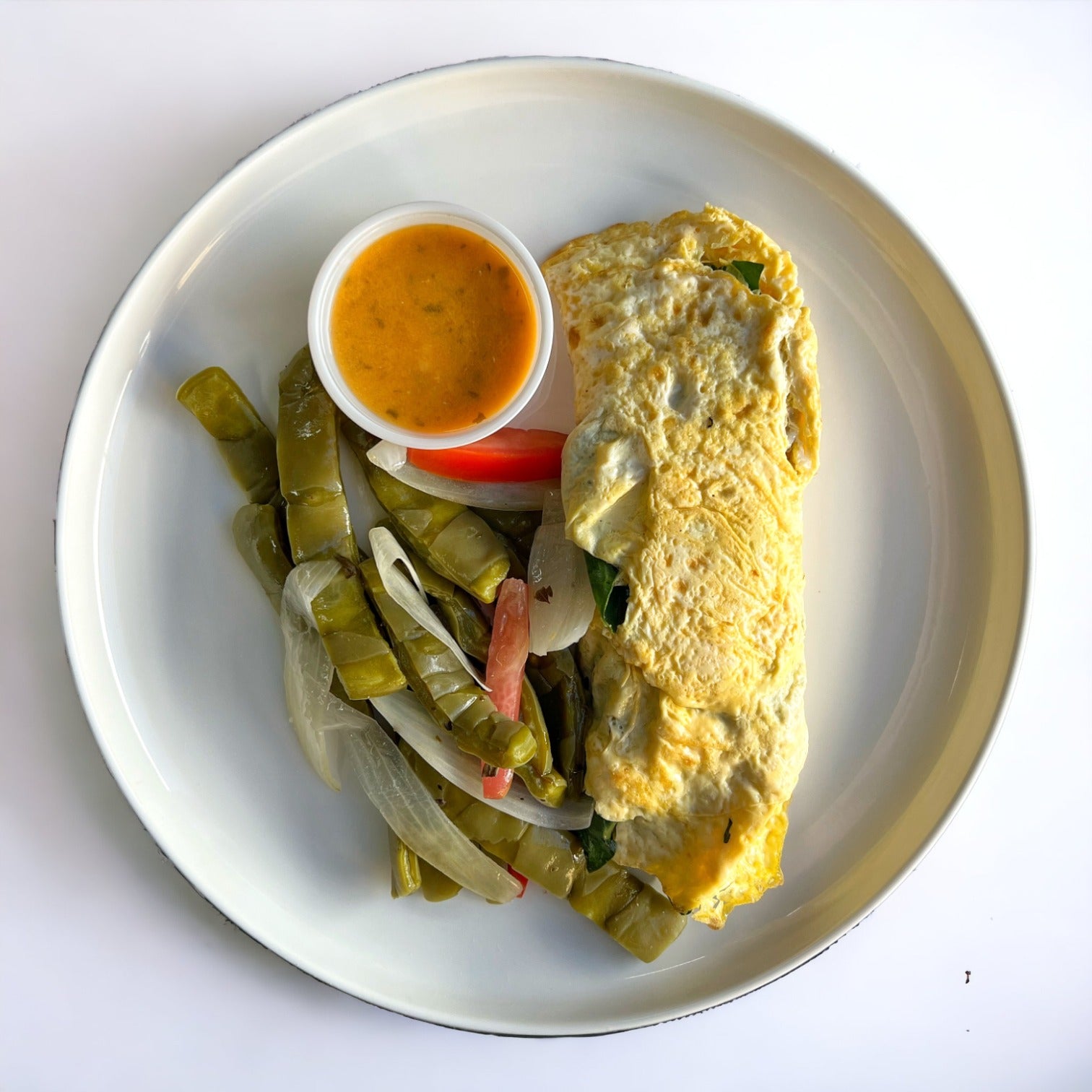 Omelette relleno de espinacas