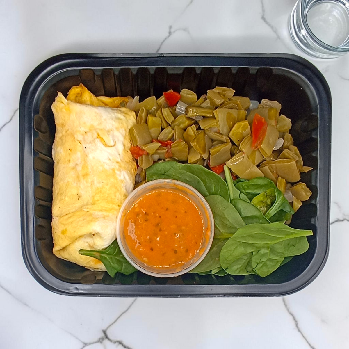 Omelette relleno de espinacas
