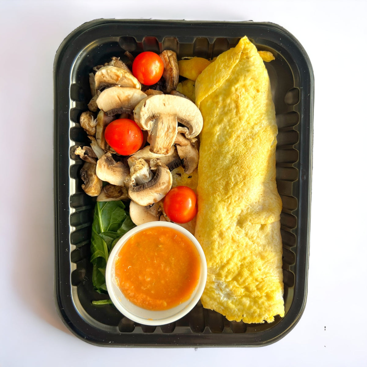 Omelette relleno de champiñones