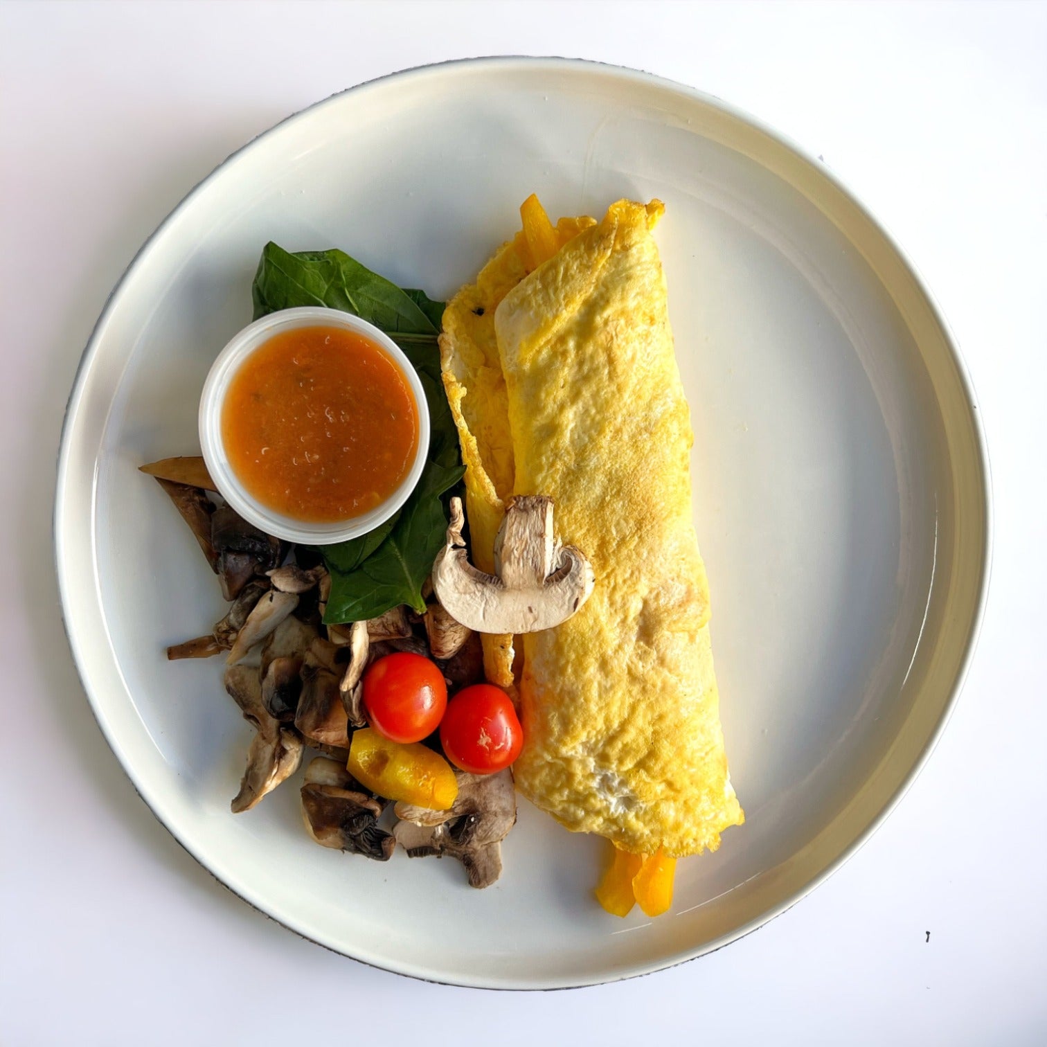 Omelette relleno de champiñones