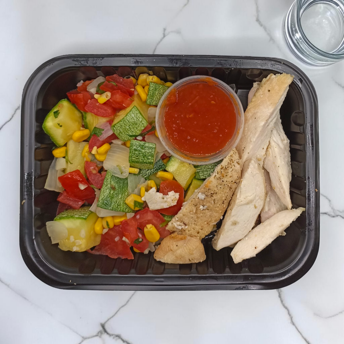 Calabacitas a la mexicana y pechuga de pollo