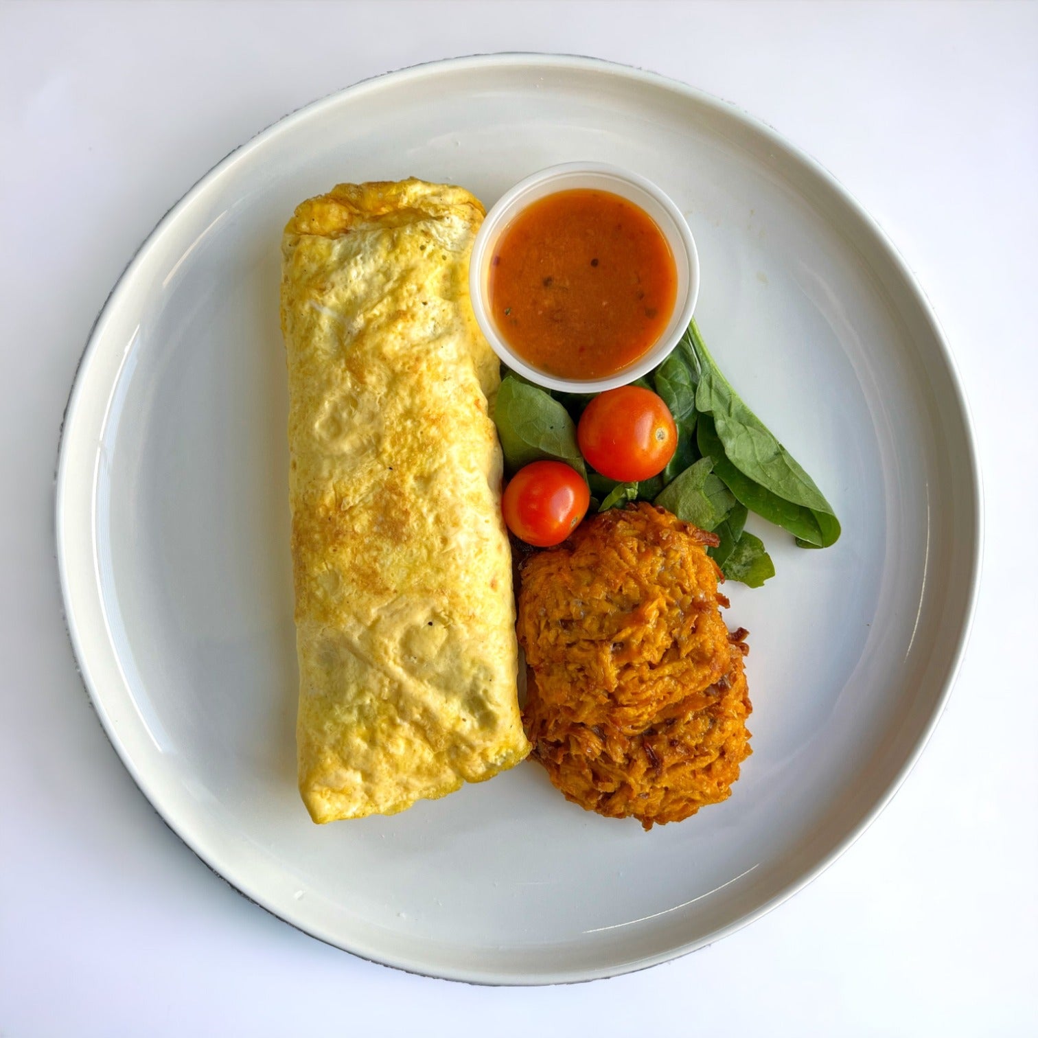 Omelette de espinacas y hash brown camote