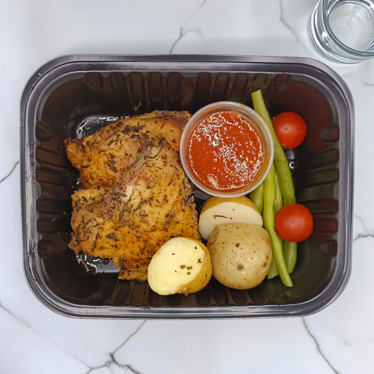 Muslos de pollo horneado con papas