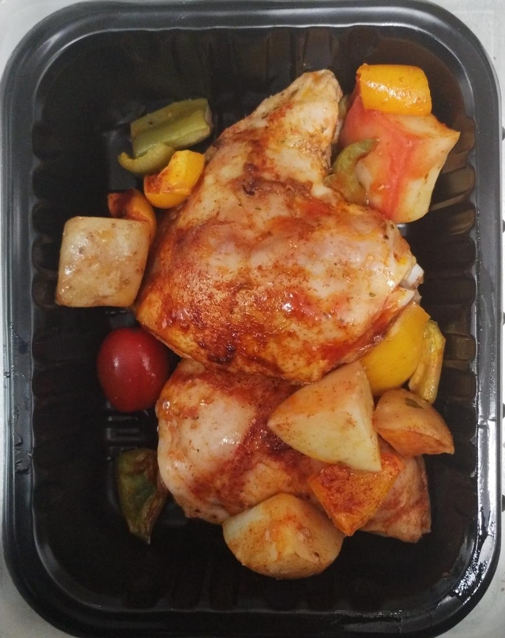 Muslos de pollo horneado con papas